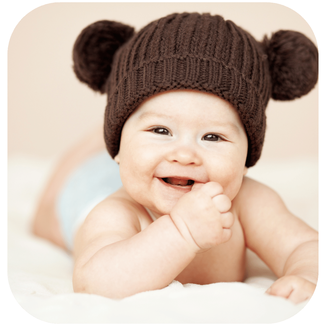 Cute baby with winter hat for first birthday party theme